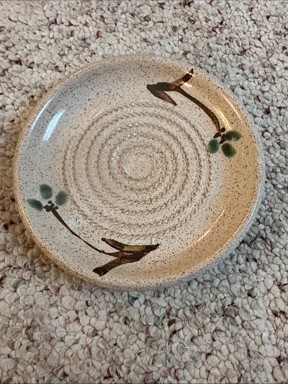 a ceramic garlic grater and olive oil dipping dish